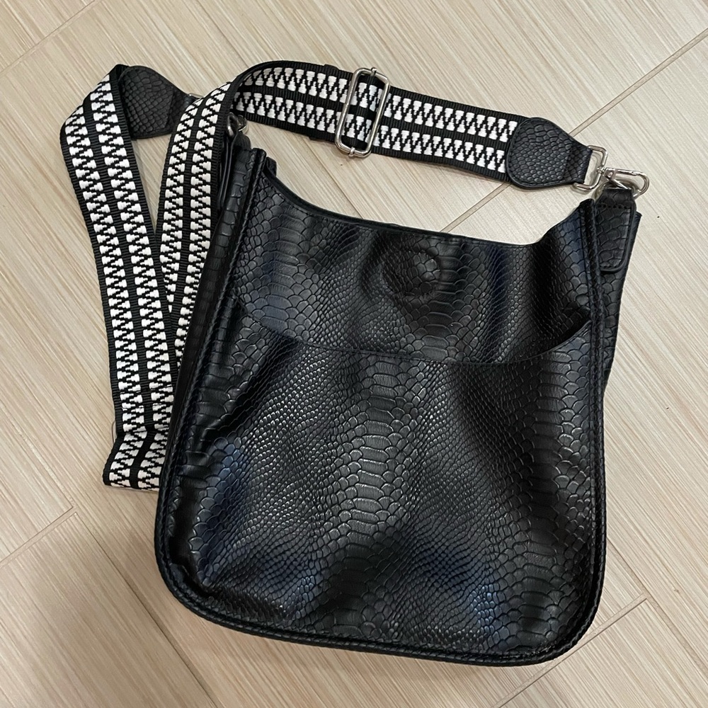 ah-dorned messenger bag
